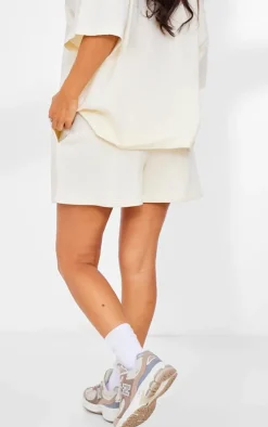 Discount PrettyLittleThing Petite Graphic Runner Shorts Cream