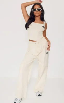 New PrettyLittleThing Petite Ribbed Branded Drawstring Wide Leg Pants Cream