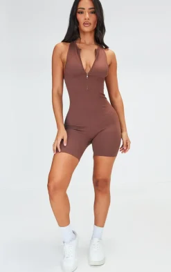 PrettyLittleThing Gym Wear*Petite Snatched Rib Zip Up Front Unitard