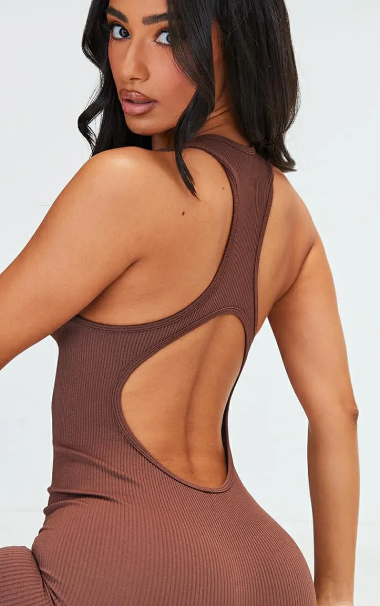 PrettyLittleThing Gym Wear*Petite Snatched Rib Zip Up Front Unitard