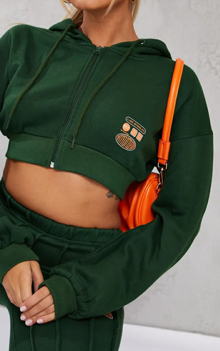 Sale PrettyLittleThing Petite Cropped Zip-up Graphic Detail Drawstring Hoodie Green