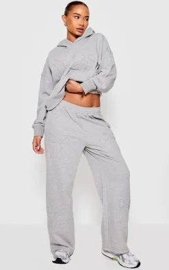 PrettyLittleThing Grey Sweatsuits*Petite Embossed Bow Detail Wide Leg Sweatpants
