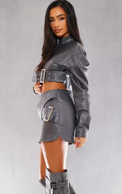 New PrettyLittleThing Petite Grey Metallic Coated Denim Buckle Detail Cropped Jacket Gunmetal