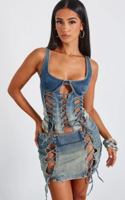 Online PrettyLittleThing Petite Lace Up Detail Denim Mini Skirt Indigo Vintage Wash
