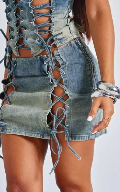 Online PrettyLittleThing Petite Lace Up Detail Denim Mini Skirt Indigo Vintage Wash
