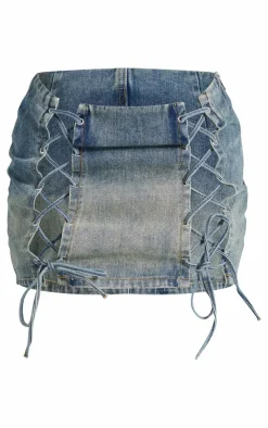 Online PrettyLittleThing Petite Lace Up Detail Denim Mini Skirt Indigo Vintage Wash