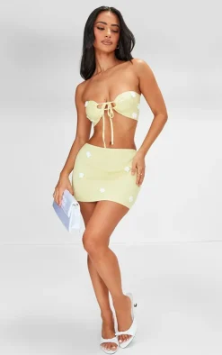 PrettyLittleThing Petite Knitted Micro Mini Skirt With Flower Details Lemon