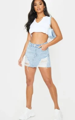 Petite Light Blue Wash Ripped Mini Denim Skirt