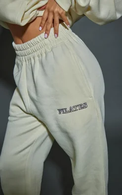 PrettyLittleThing Petite Pilates Graphic Straight Leg Sweatpants Oatmeal