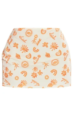 Online PrettyLittleThing Petite Printed Low Rise Mini Skirt Orange