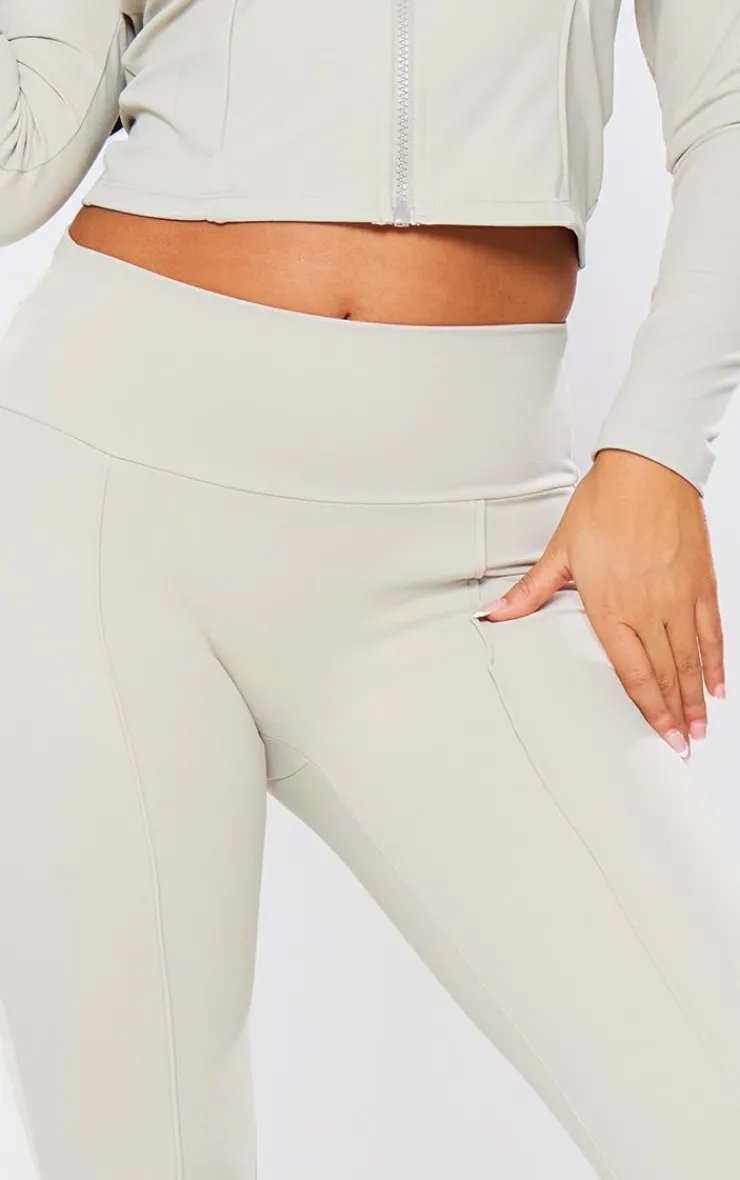Discount PrettyLittleThing Petite Snatched Sculpt Seam Detail Flared Pants Pale Khaki