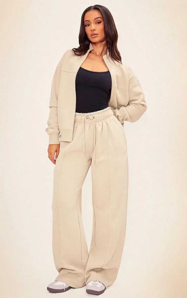 New PrettyLittleThing Petite Seam Detail Zip Through Track Top Pebble