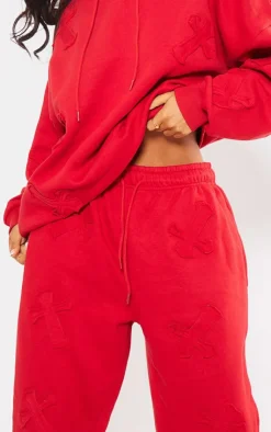 PrettyLittleThing Graphic Sweatsuits*Petite Cross Applique Embroide Sweatpants