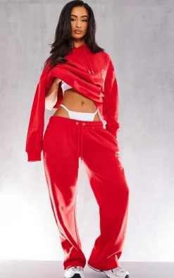 Online PrettyLittleThing Petite Graphic Straight Leg Sweatpants Red