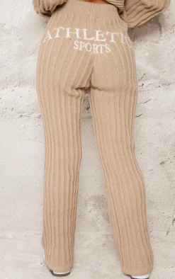 Best PrettyLittleThing Petite Athletic Sport Embroidered Knit Flared Pants Stone