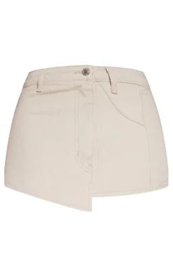 Online PrettyLittleThing Petite Denim Mini Skirt With Asymmetric Hem Stone