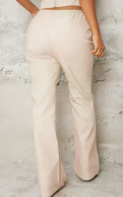 Online PrettyLittleThing Petite Faux Leather Zip Front Flared Pants Stone