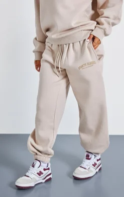 Sale PrettyLittleThing Petite Sports Classic Graphic Cuffed Sweatpants Stone