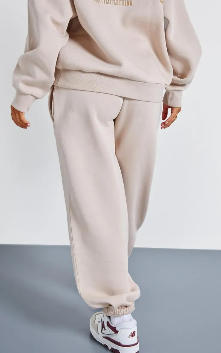 Sale PrettyLittleThing Petite Sports Classic Graphic Cuffed Sweatpants Stone