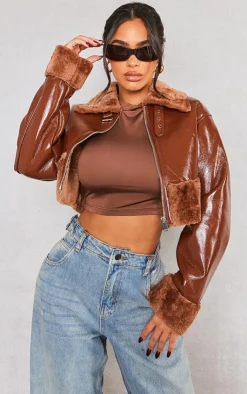 PrettyLittleThing Faux Fur Coats*Petite Faux Fur Trim Buckle Collar Vinyl Cropped Jacket