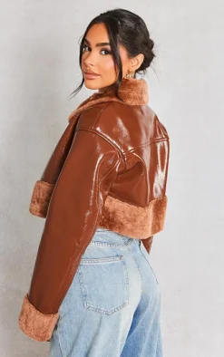 PrettyLittleThing Faux Fur Coats*Petite Faux Fur Trim Buckle Collar Vinyl Cropped Jacket