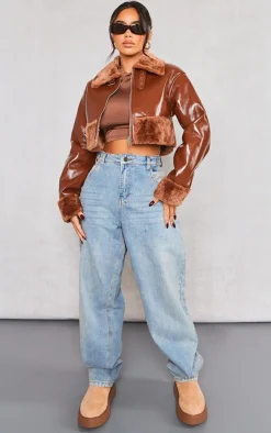 PrettyLittleThing Faux Fur Coats*Petite Faux Fur Trim Buckle Collar Vinyl Cropped Jacket