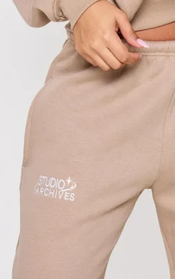 Discount PrettyLittleThing Petite Studio Archives Thin Waistband Wide Leg Sweatpants Taupe