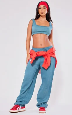 Online PrettyLittleThing Petite Acid Wash Elasticated Crop Top Teal