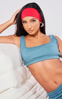 Online PrettyLittleThing Petite Acid Wash Elasticated Crop Top Teal