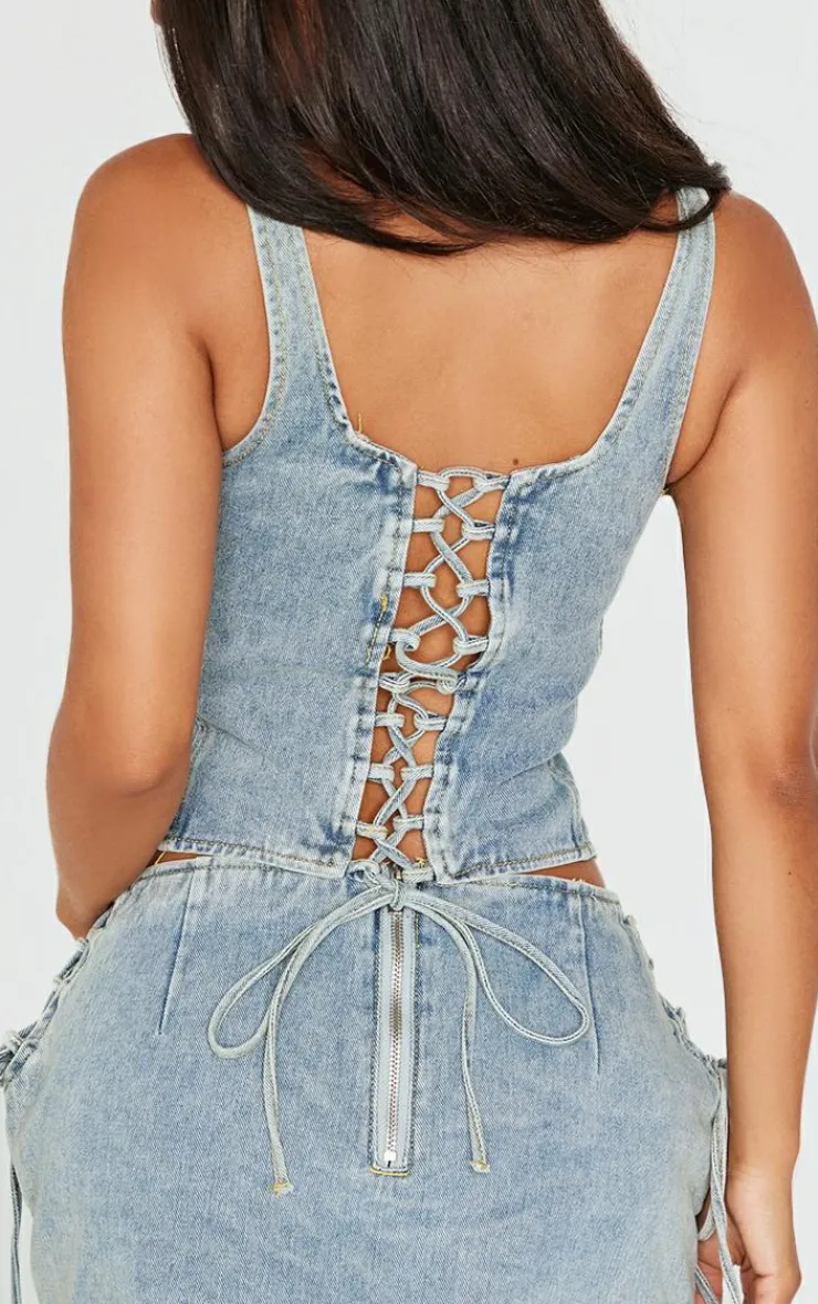 PrettyLittleThing Petite Denim Lace Up Corset Top Vintage Wash