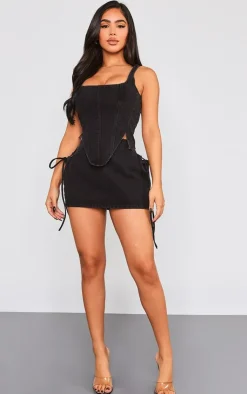 Online PrettyLittleThing Petite Denim Lace Up Mini Skirt Washed Black