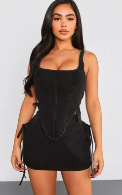 Online PrettyLittleThing Petite Denim Lace Up Mini Skirt Washed Black