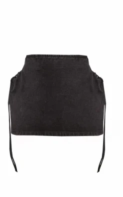 Online PrettyLittleThing Petite Denim Lace Up Mini Skirt Washed Black