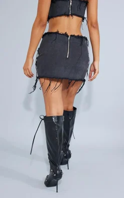 Online PrettyLittleThing Petite Distressed Panel Belted Denim Mini Skirt Washed Black