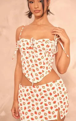 Online PrettyLittleThing Petite Denim Strawberry Printed Low Rise Mini Skirt White