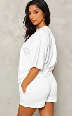 PrettyLittleThing Petite Embossed Bow Detail T-shirt White
