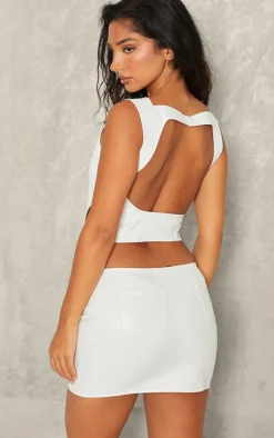 Best PrettyLittleThing Petite Faux Leather Open Back Asymmetric Top White