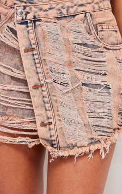 PrettyLittleThing Acid Wash Distressed Wrap Over Denim Skirt Pink