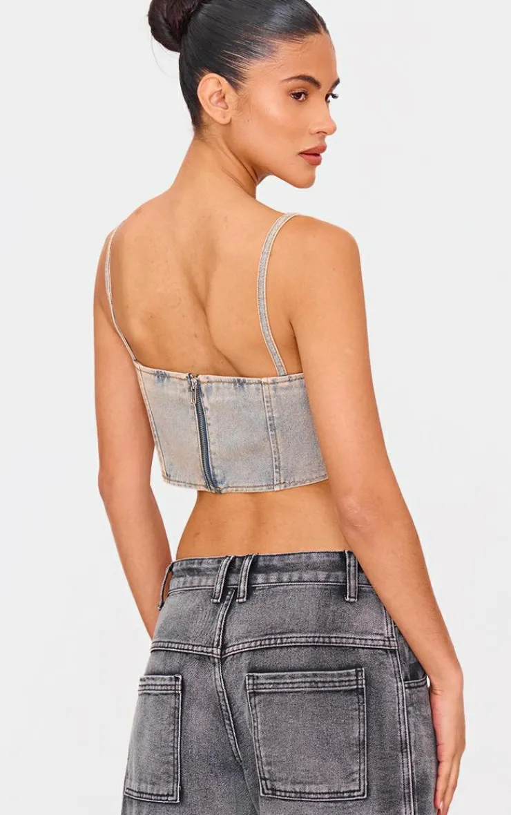 PrettyLittleThing Corsets*Pink Tint Diamante Detail Curved Hem Denim Corset Top