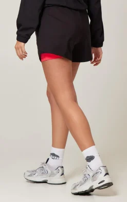 PrettyLittleThing Gym Shorts*PLT Run Pocket Detail Underlayer Shell Runner Shorts