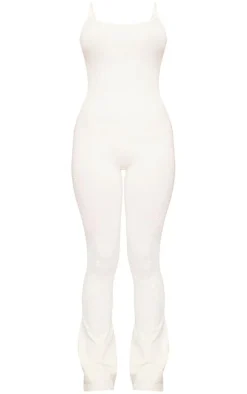 PrettyLittleThing Seamless Gym Wear*PLT SPORT Bone Seamless Laser Cut Strappy Gym Flare Unitard