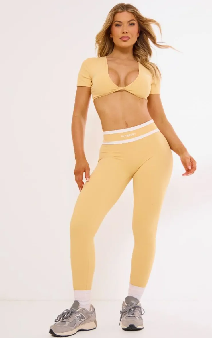PrettyLittleThing Workout Tops*PLT SPORT Sculpt Twist Front Contrast Detail Open Back Crop Top