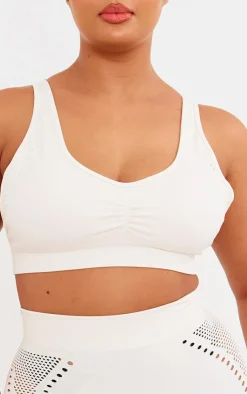 PrettyLittleThing Sports Bras*PLT SPORT Plus Bone Seamless Laser Cut Sports Bra