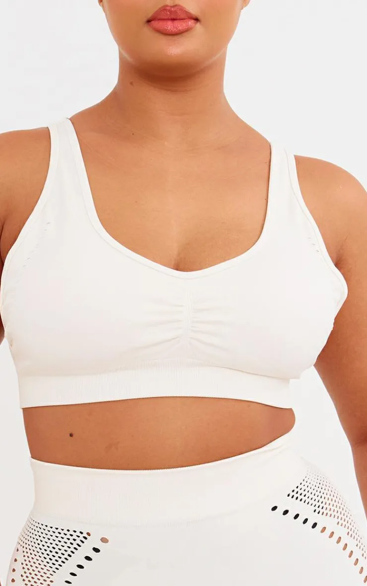PrettyLittleThing Sports Bras*PLT SPORT Plus Bone Seamless Laser Cut Sports Bra