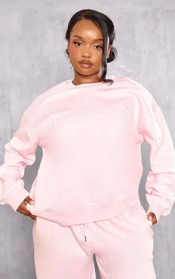 PrettyLittleThing Graphic Sweatsuits*Plus Embossed Graphic Oversized Sweatshirt