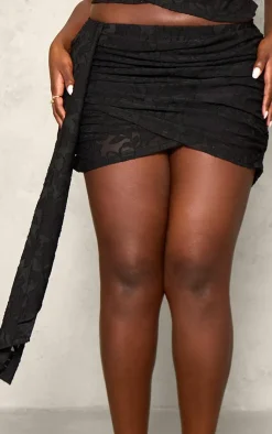 Online PrettyLittleThing Plus Devore Ruched Drape Detail Mini Skirt Black