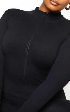 PrettyLittleThing Snatched*Plus Structured Snatched Rib High Neck Jumpsuit