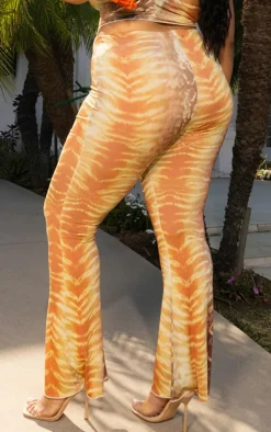 Sale PrettyLittleThing Plus Animal Print Flared Pants Brown