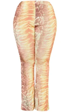 Sale PrettyLittleThing Plus Animal Print Flared Pants Brown