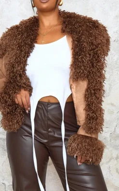 PrettyLittleThing Faux Fur Coats*Plus Distressed Contrast Faux Fur Cuff Detail Cropped Jacket